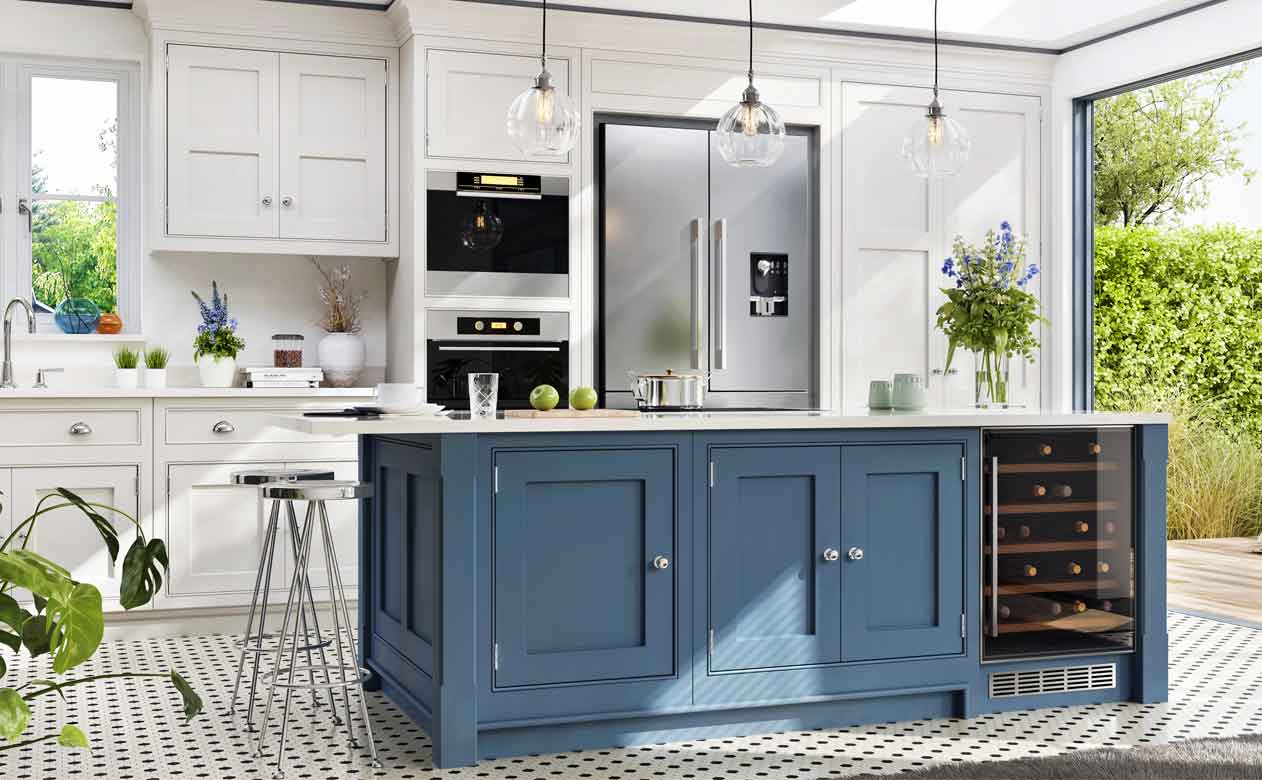 kitchen with white and blue cabinets and white countertops